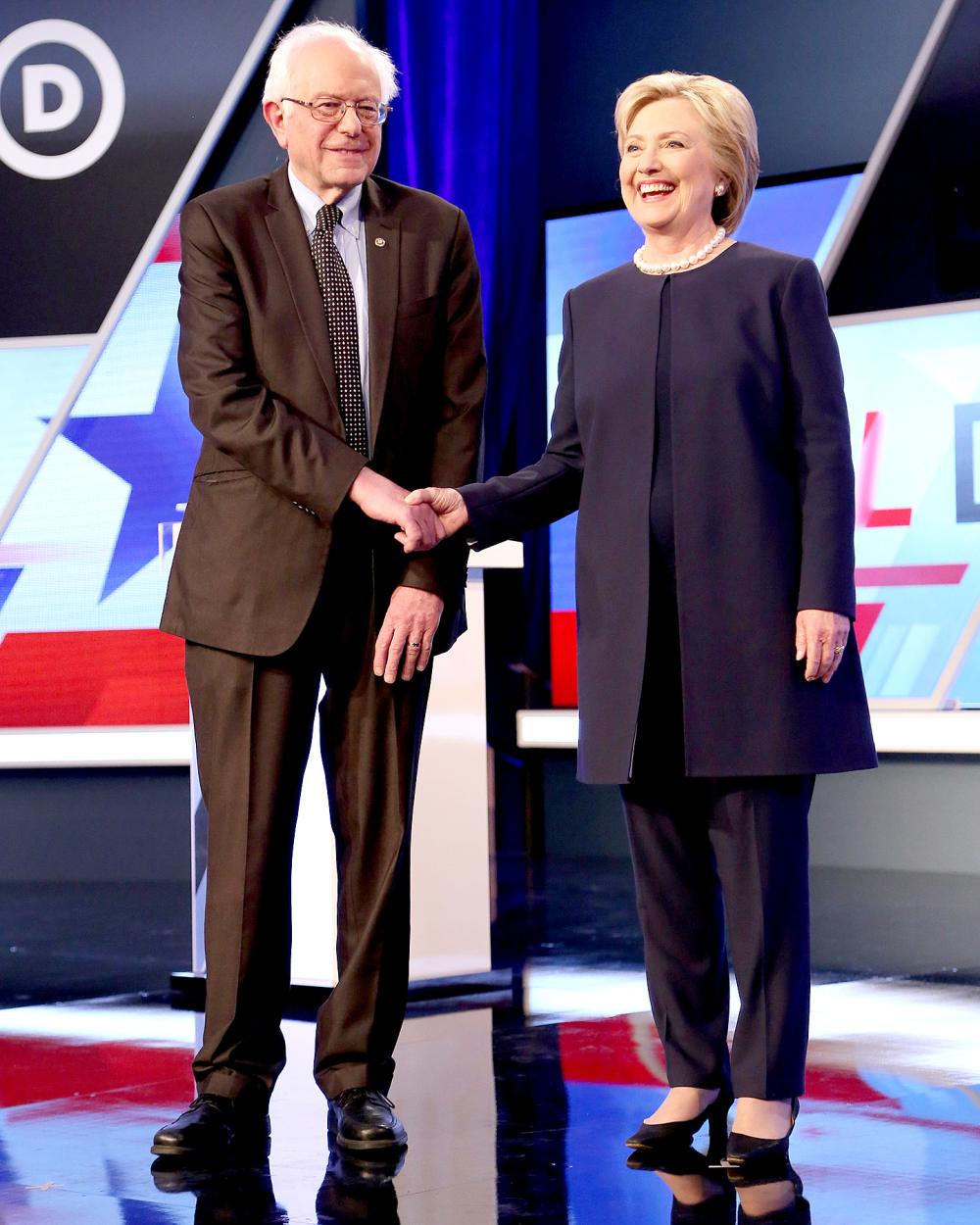 Bernie Sanders and Hillary Clinton are seen before the Univision News and Washington Post Democratic Presidential Primary Debate on the Miami Dade College Kendall Campus on March 9, 2016, in Miami.