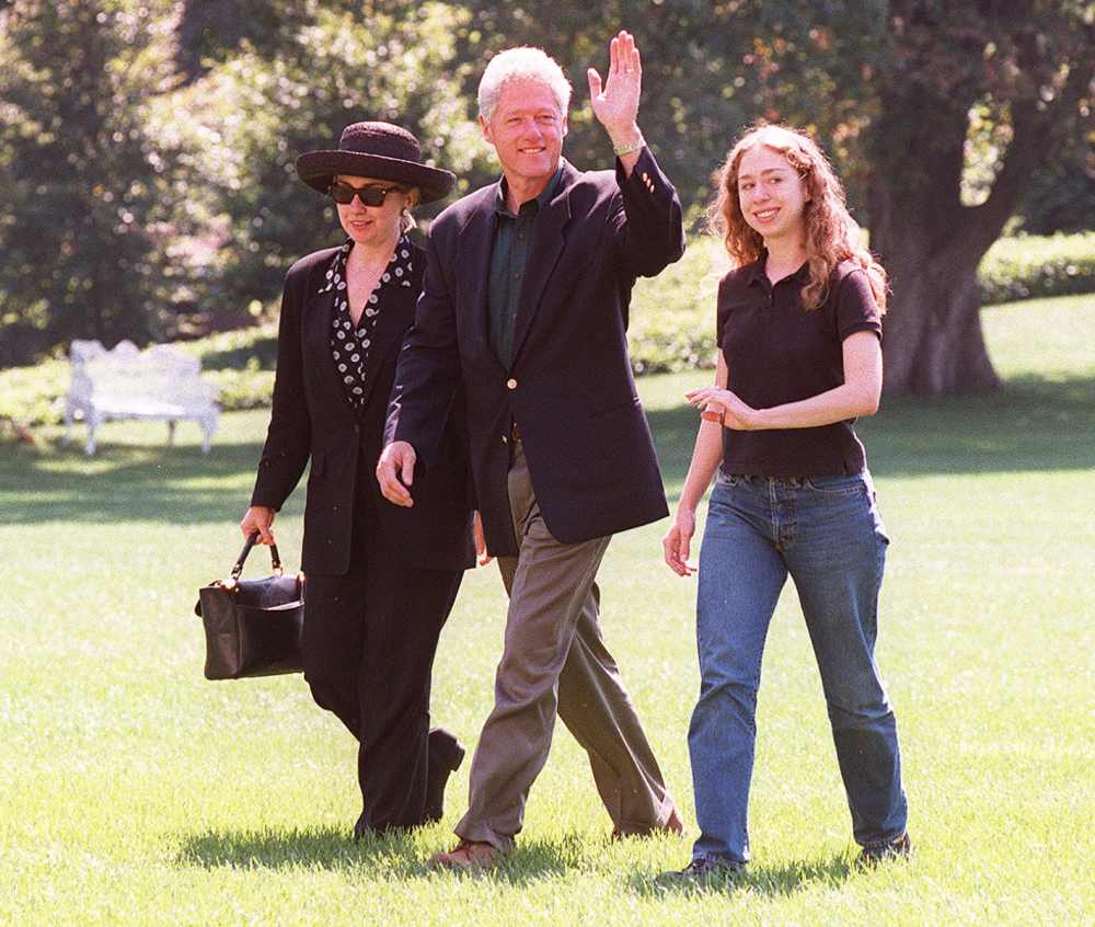 US President Bill Clinton, First Lady Hillary Clinton and daughter Chelsea arrive at the White House in Washington, DC in September after their three-week vacation In Martha's Vineyard, MA.
