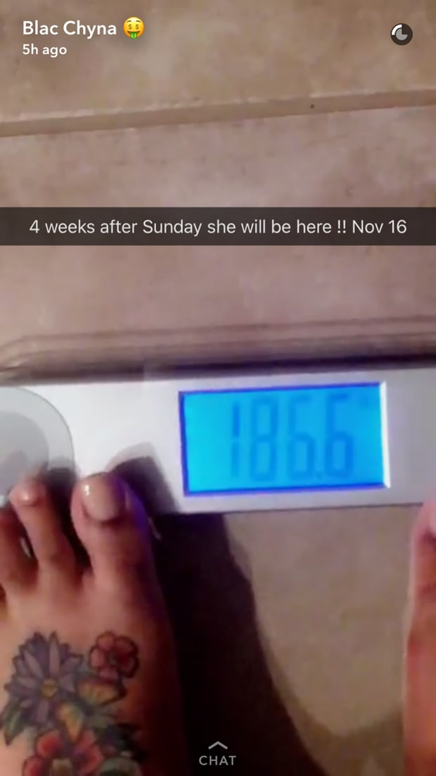 Blac Chyna reads the scale to see how much pregnancy weight she's gained