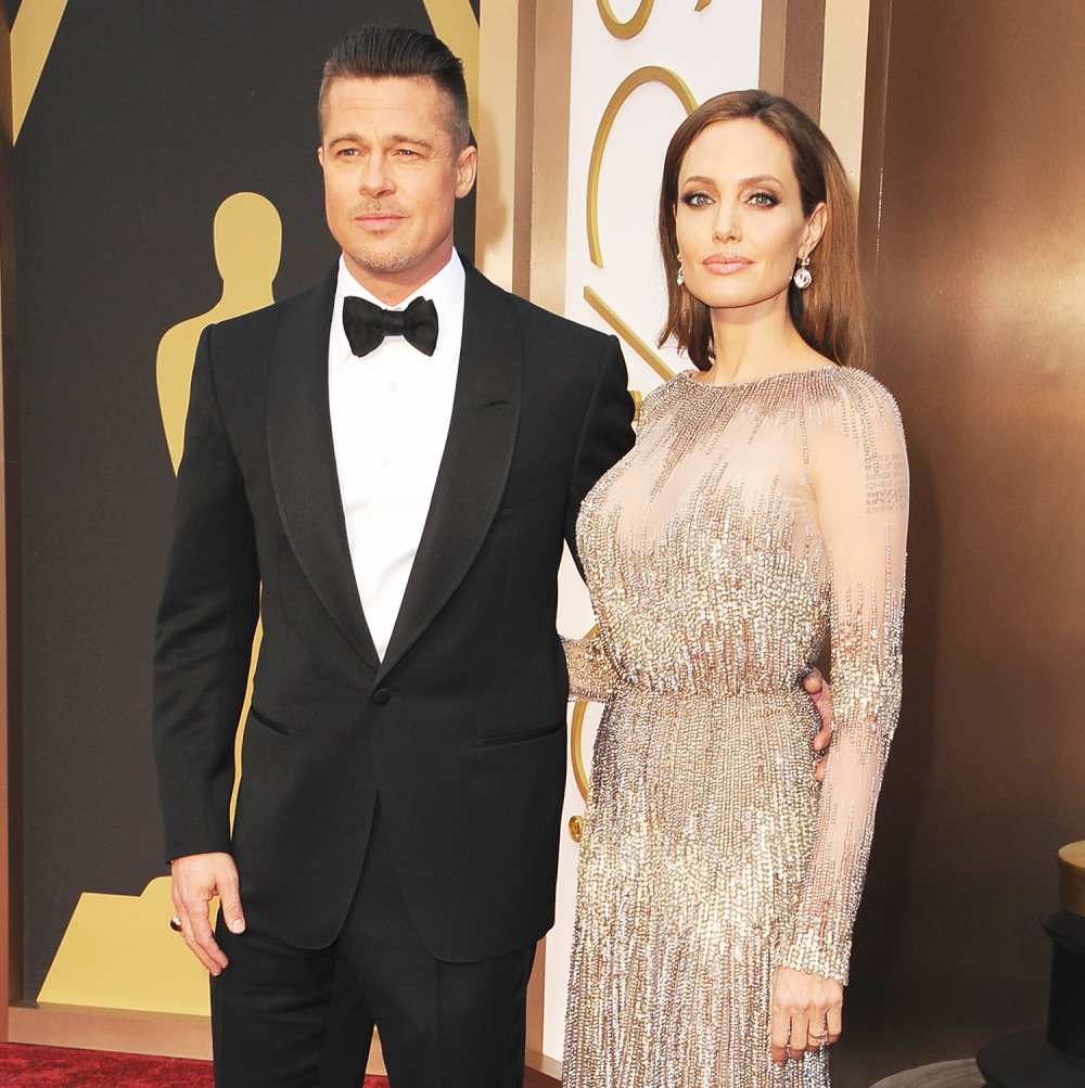 Brad Pitt and Angelina Jolie attend the Oscars held at Hollywood & Highland Center on March 2, 2014 in Hollywood, California.