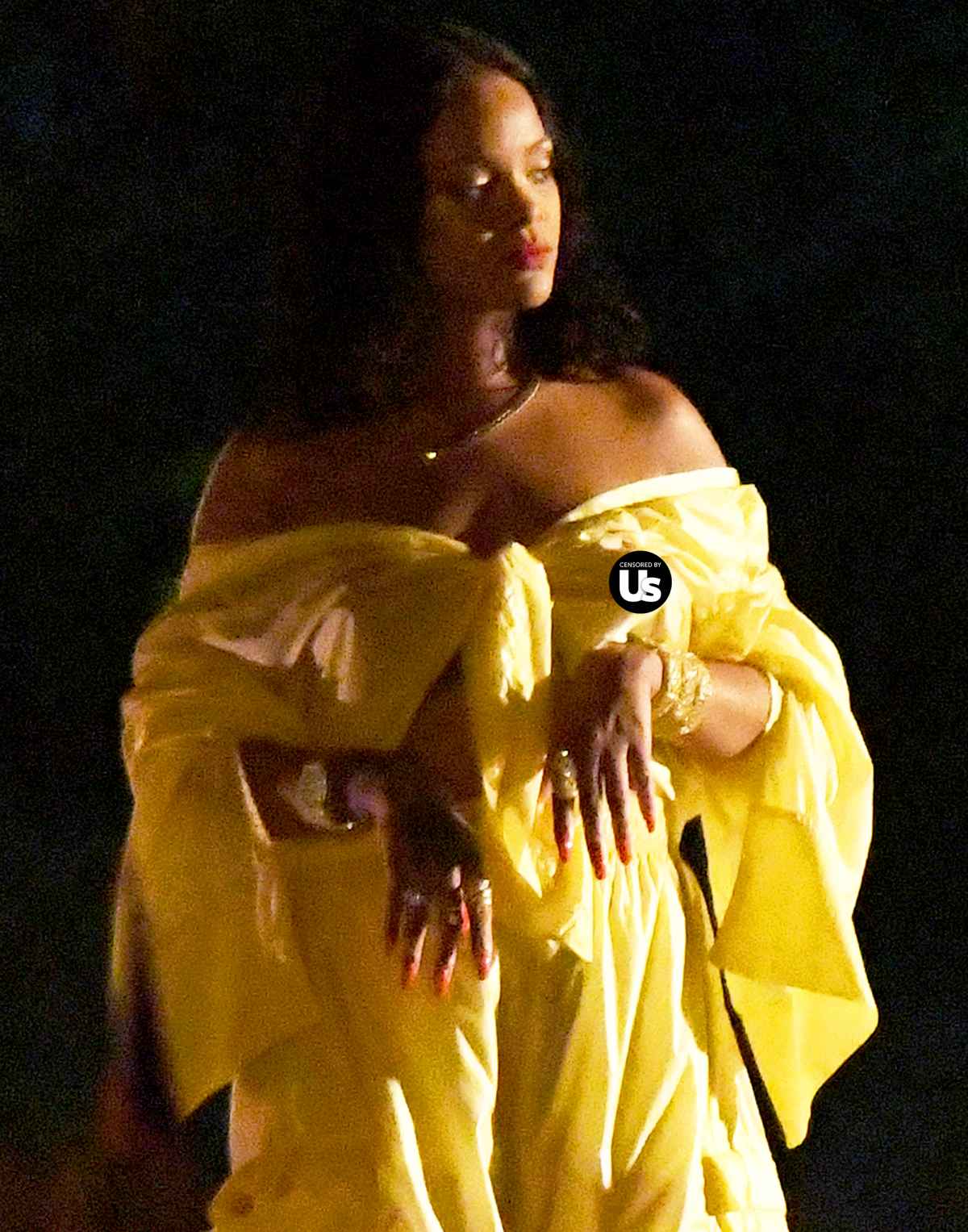 Rihanna Wears Giant Cardigan, Shows Nipple Piercing at Chanel