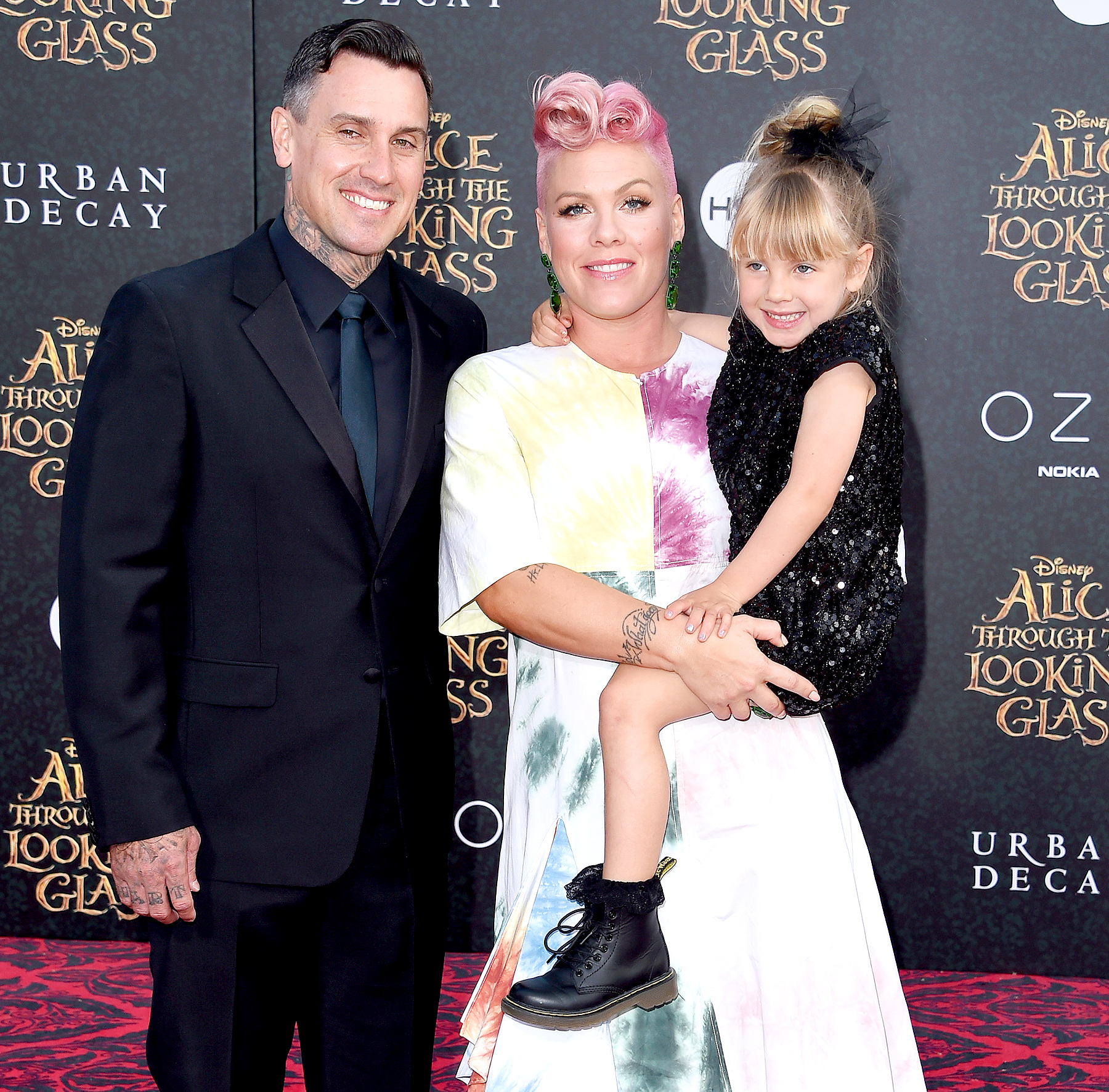 Carey Hart, Pink and Willow Sage Hart arrive at the premiere of Disney's 'Alice Through The Looking Glass' at the El Capitan Theatre on May 23, 2016 in Hollywood, California. Axelle/Bauer-Griffin/FilmMagic