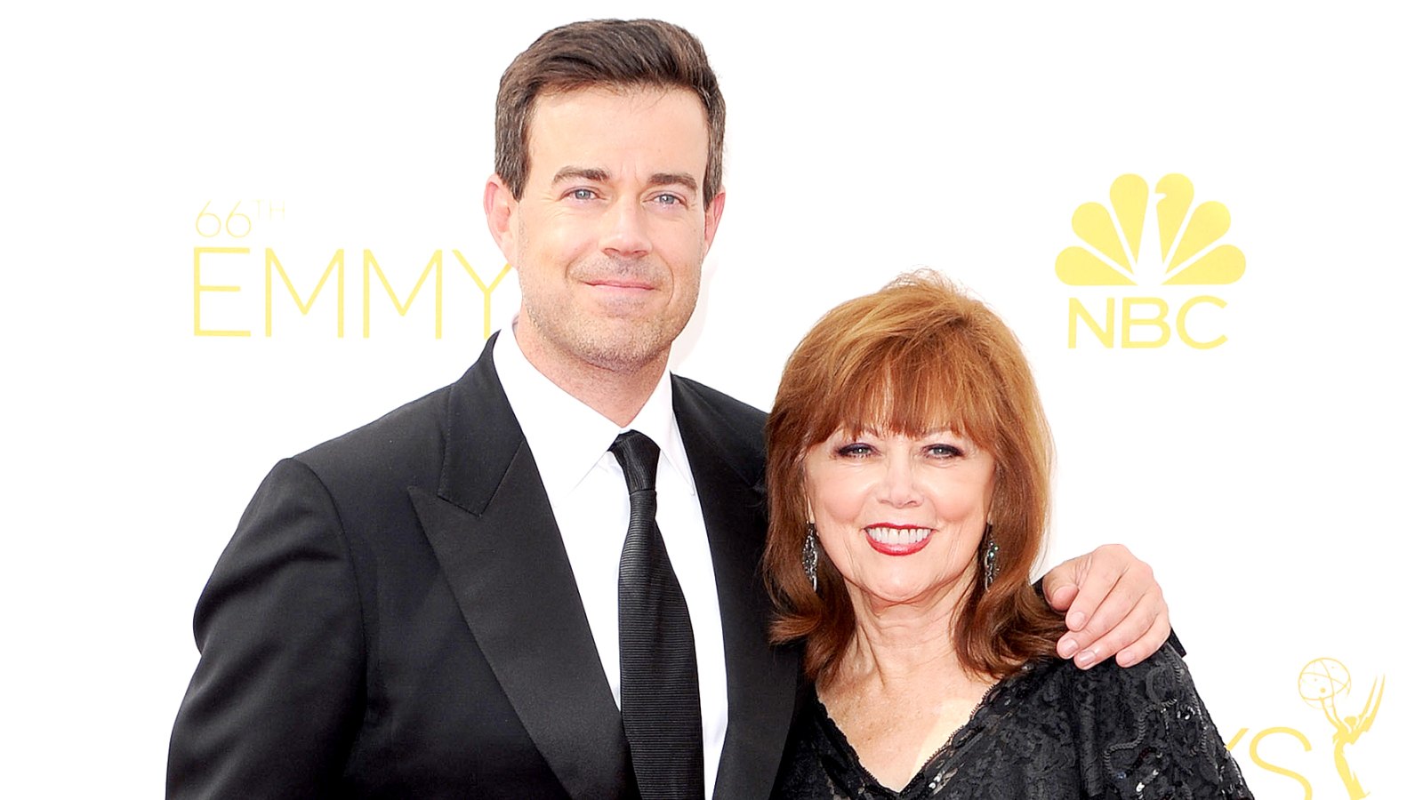 Carson Daly and Pattie Daly Caruso arrive at the 66th Annual Primetime Emmy Awards at Nokia Theatre L.A. Live on August 25, 2014 in Los Angeles, California.