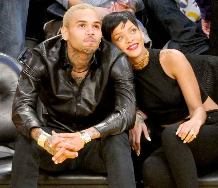 Chris Brown and Rihanna attend a basketball game between the New York Knicks and the Los Angeles Lakers at Staples Center on December 25, 2012 in Los Angeles, California.