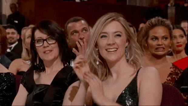 Chrissy Teigen reacting at Oscars 2016