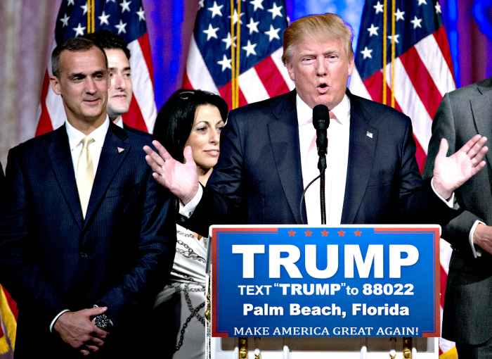 Donald Trump, president and chief executive of Trump Organization Inc. and 2016 Republican presidential candidate, center, speaks during a news conference with Corey Lewandowski, campaign manager for Trump, left, at the Mar-A-Lago Club in Palm Beach, Florida, U.S., on Tuesday, March 15, 2016.