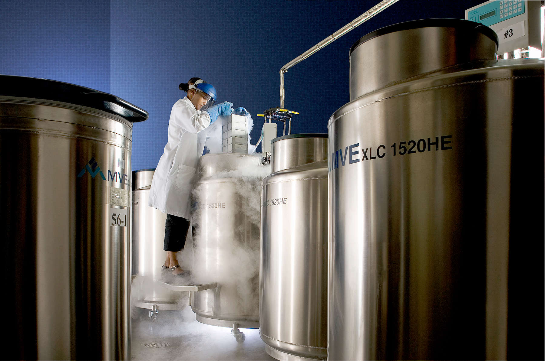 A cryogenic storage Room and technician.