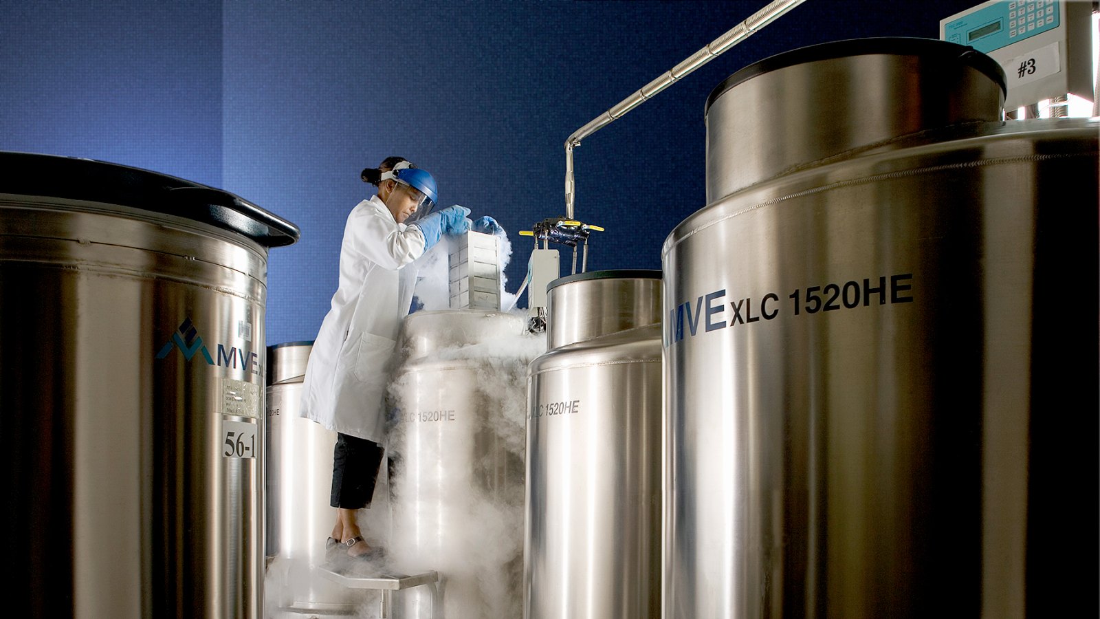 A cryogenic storage Room and technician.