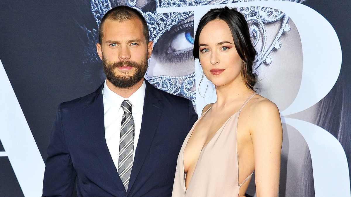 Dakota Johnson Wears Plunging Pink Dress at 'Fifty Shades' Premiere | Us Weekly Dakota Johnson Wears Plunging Pink Dress at 'Fifty Shades' Premiere | Us Weekly