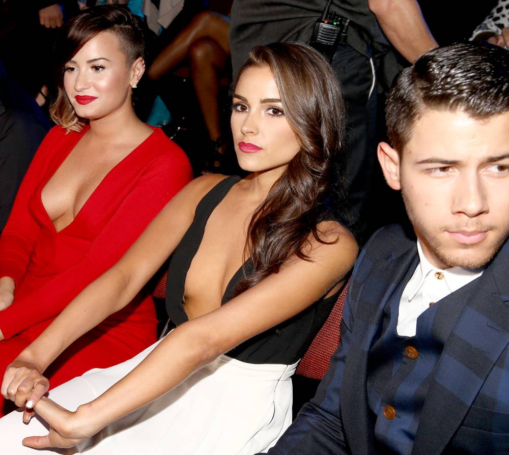 Demi Lovato, Olivia Culpo and Nick Jonas attend the 2014 MTV Video Music Awards.