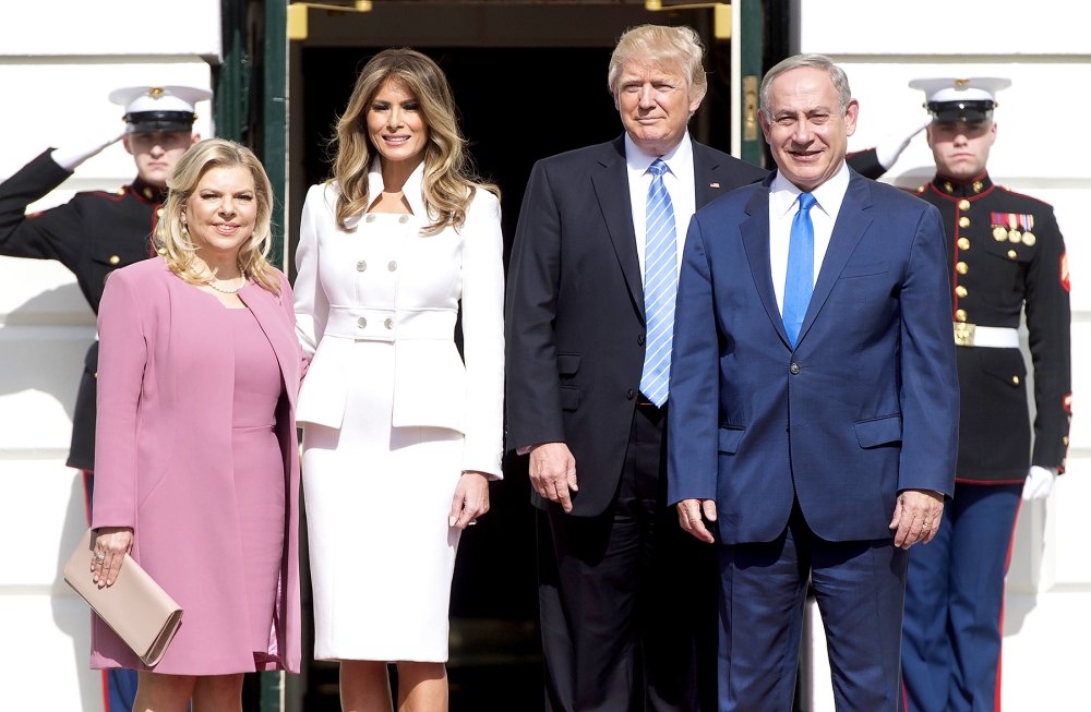 US President Donald Trump (C-R) and Israeli Prime Minister Benjamin Netanyahu (R), along with their wives, First Lady Melania Trump (C-L) and Sara Netanyahu (L), pose at the White House in Washington, DC, February 15, 2017.
