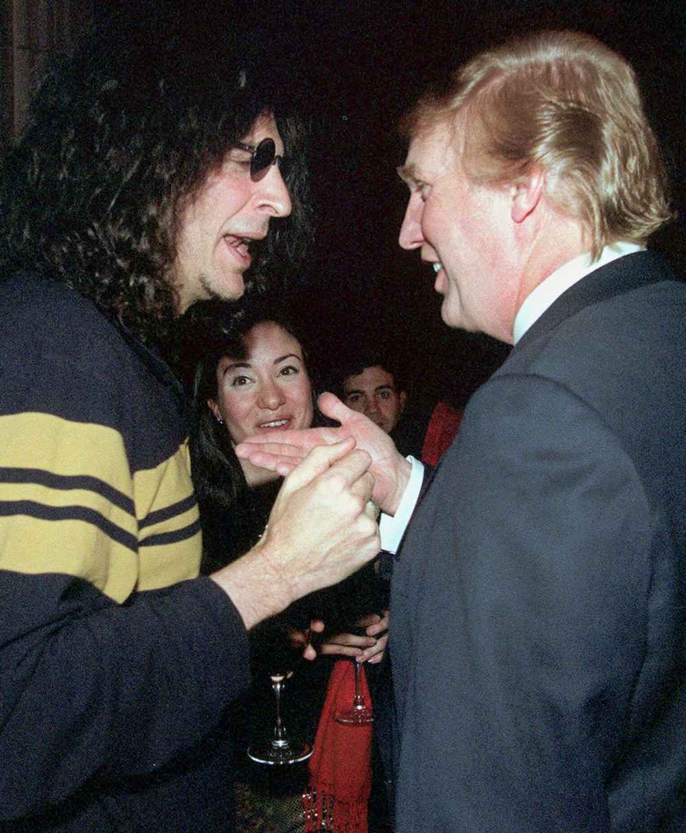 Howard Stern, left, speaks with Donald Trump at a party given by the New York Post, Wednesday, Feb. 9, 2000, in New York.