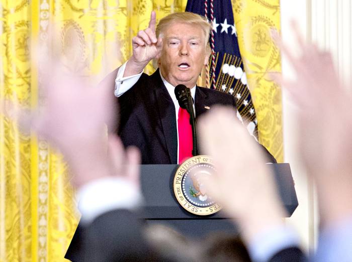 U.S. President Donald Trump takes a question from members of the media during a news conference to announce Alexander Acosta as U.S. labor secretary nominee in the East Room of the White House in Washington, D.C., U.S., on Thursday, Feb. 16, 2017. Acosta will replace Trumps first nominee for the position, Andy Puzder, who withdrew his name Wednesday amid controversy over his personal life and private sector background.