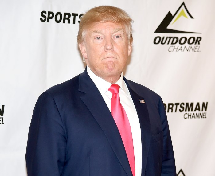 Donald Trump listens to a question during a news conference before speaking during the Outdoor Channel and Sportsman Channel's 16th annual Outdoor Sportsman Awards.