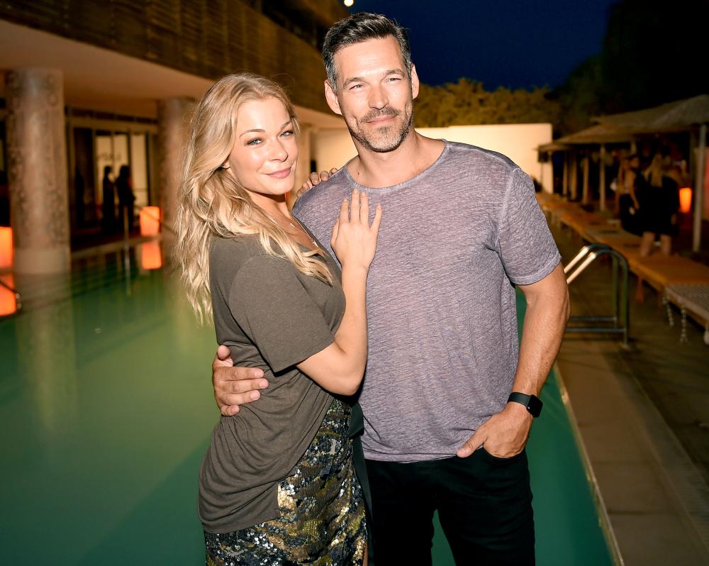 Eddie Cibrian and LeAnn Rimes attend the Maxim Magazine Worldwide Swimwear Collection launch at SLS South Beach on July 18, 2015 in Miami, Florida. Fabiano Silva/Getty Images for Maxim