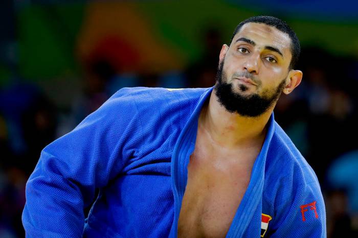 Egypt's Islam El Shehaby reacts after losing to Israel's Or Sasson during the men's over 100-kg judo competition at the 2016 Summer Olympics in Rio de Janeiro, Friday, Aug. 12, 2016.