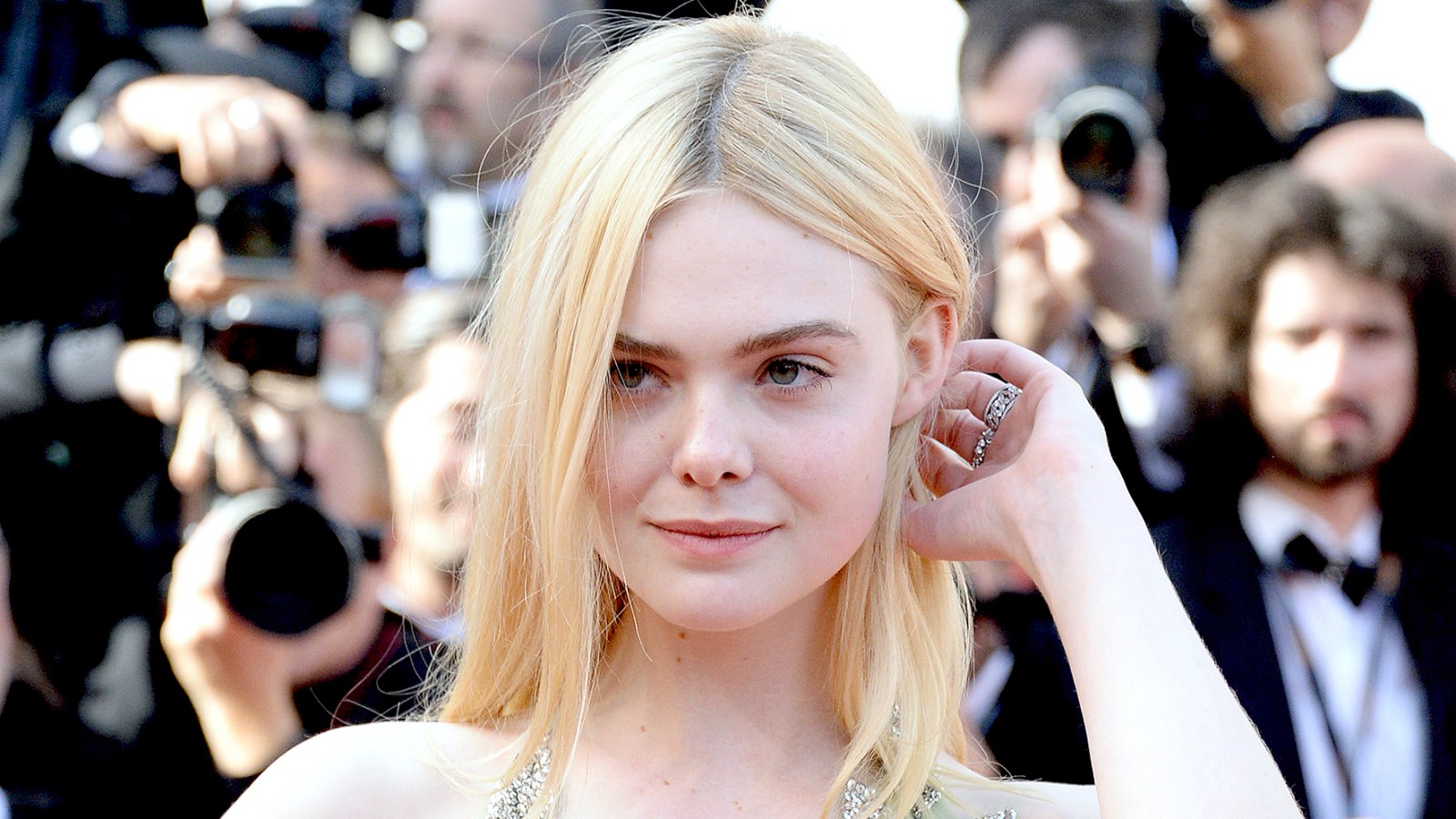 Elle Fanning departs after the "How To Talk To Girls At Parties" screening during the 70th annual Cannes Film Festival at Palais des Festivals on May 21, 2017 in Cannes, France.