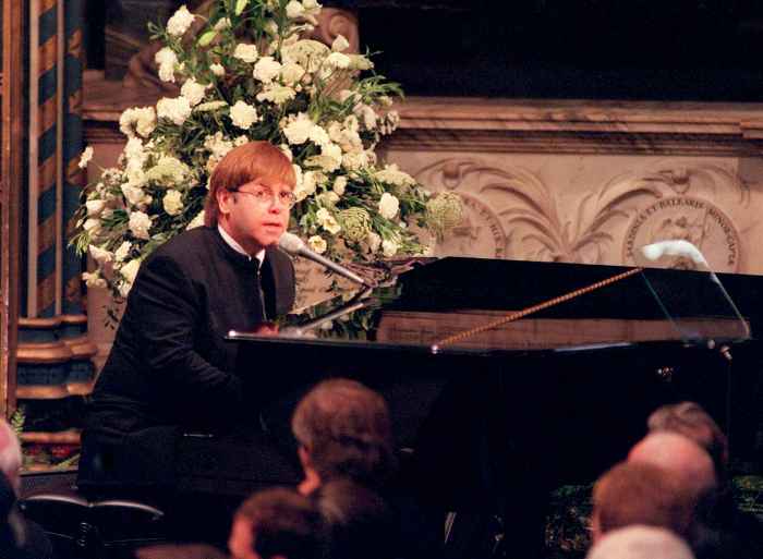 Sir Elton John signing 'Candle In The Wind' at the funeral of Diana, Princess of Wales on September 6, 1997.
