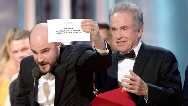 Jordan Horowitz, Warren Beatty and Jimmy Kimmel on stage.
