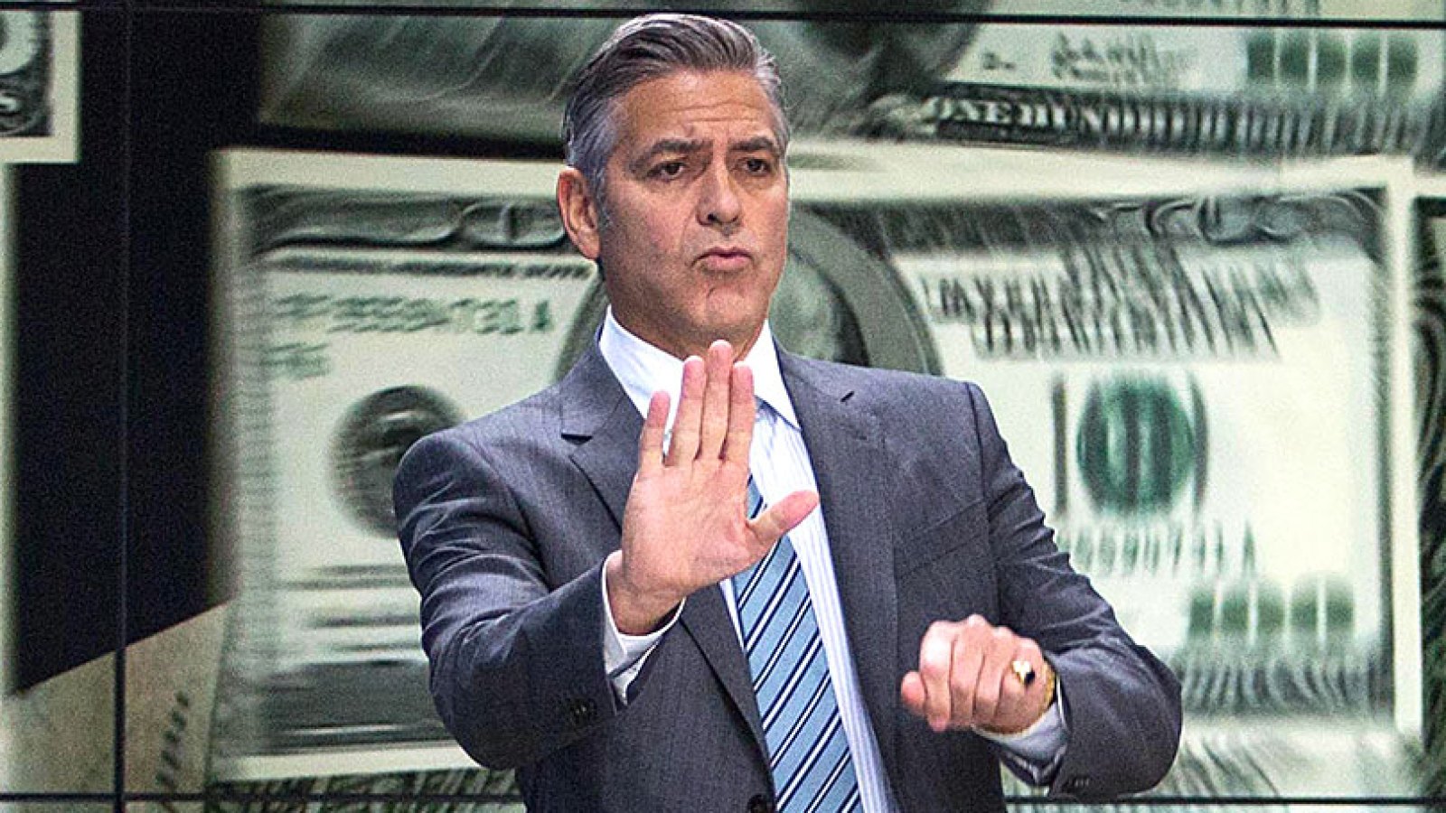 George Clooney (center) stars as Lee Gates in TriStar Pictures' MONEY MONSTER