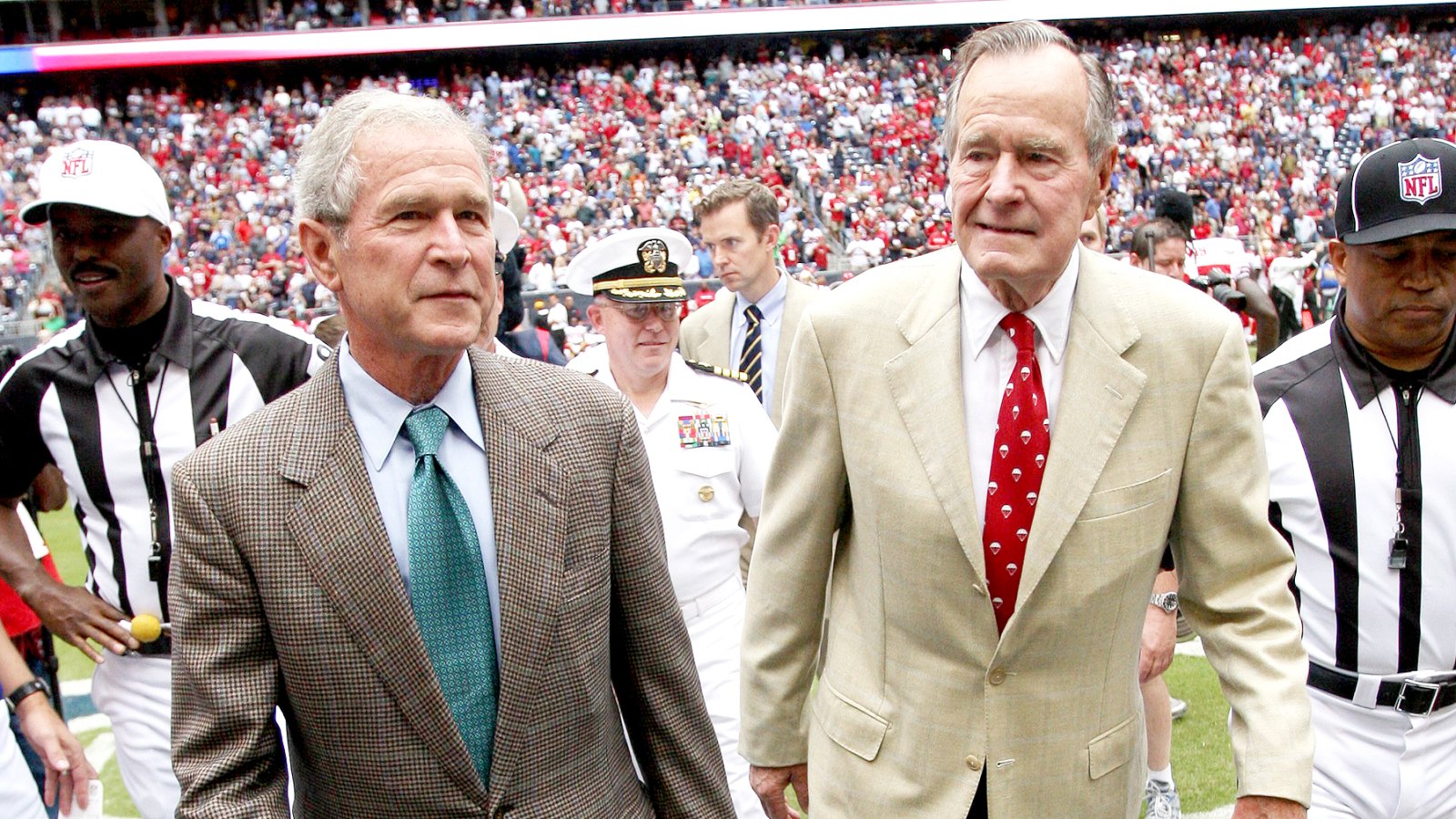 Former U.S. Presidents George W. Bush and George H.W. Bush at the San Francisco 49ers and Houston Texans game at Reliant Stadium in Houston on October 25, 2009.