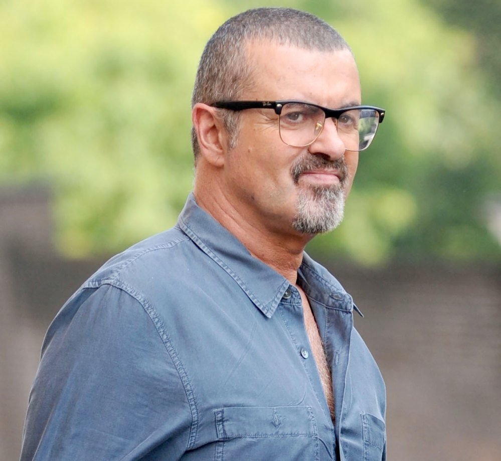 George Michael leaves the Cote Brassiere restaurant in Highgate on August 25, 2013.