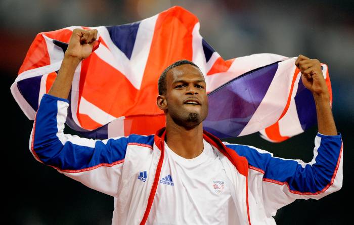 Britain's Germaine Mason celebrates winning the silver in the men's high jump final during the athletics competitions in the National Stadium at the Beijing 2008 Olympics in Beijing.