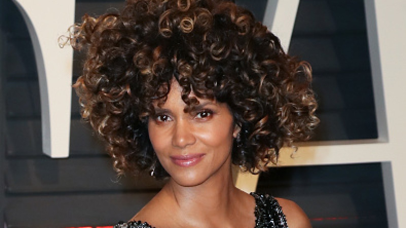 Halle Berry Poses Braless in Sheer Top, Twitter Reacts