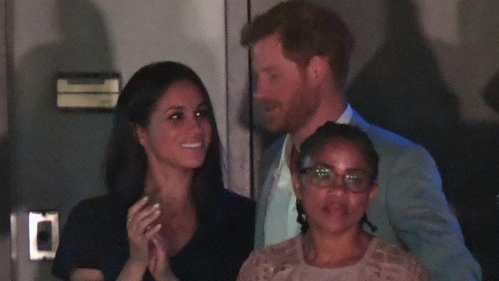 Prince Harry Kisses Meghan Markle, Hangs With Her Mom