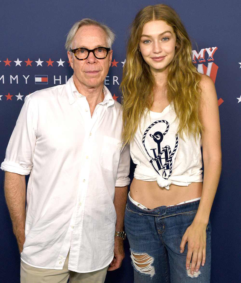 Fashion designer Tommy Hilfiger (left) and model Gigi Hadid attend the #TOMMYNOW Women's Fashion Show during New York Fashion Week at Pier 16 on Sept. 9, 2016, in New York City.