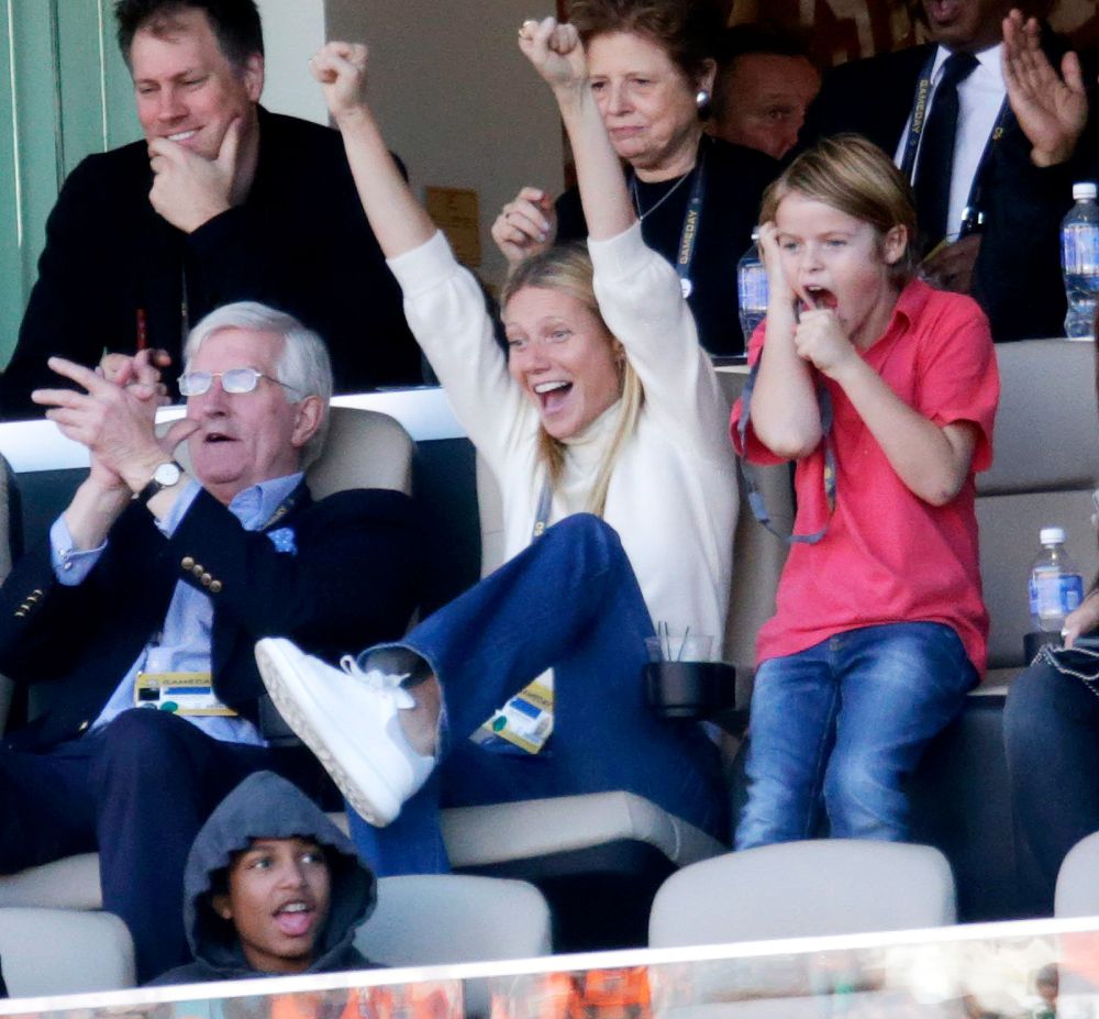 Gwyneth Paltrow and her son Moses Martin cheer from the sidelines at Super Bowl 50 in Santa Clara, California on February 7, 2016.