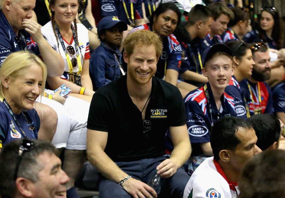 Prince Harry sits in the crowd watching sitting volleyball in Orlando, Florida
