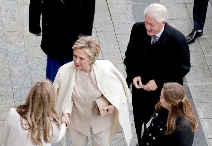 Former US President Bill Clinton and former Secretary of State Hillary Clinton arrive near the east front steps of the Capitol Building before President-elect Donald Trump is sworn in at the 58th Presidential Inauguration on Capitol Hill in Washington, D. on January 20, 2017.