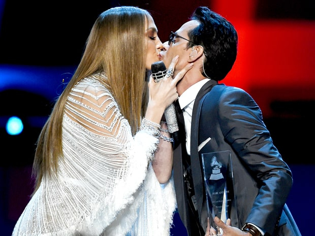Jennifer Lopez and singer Marc Anthony kiss onstage during the 17th Annual Latin Grammy Awards at T-Mobile Arena on Nov. 17, 2016, in Las Vegas.