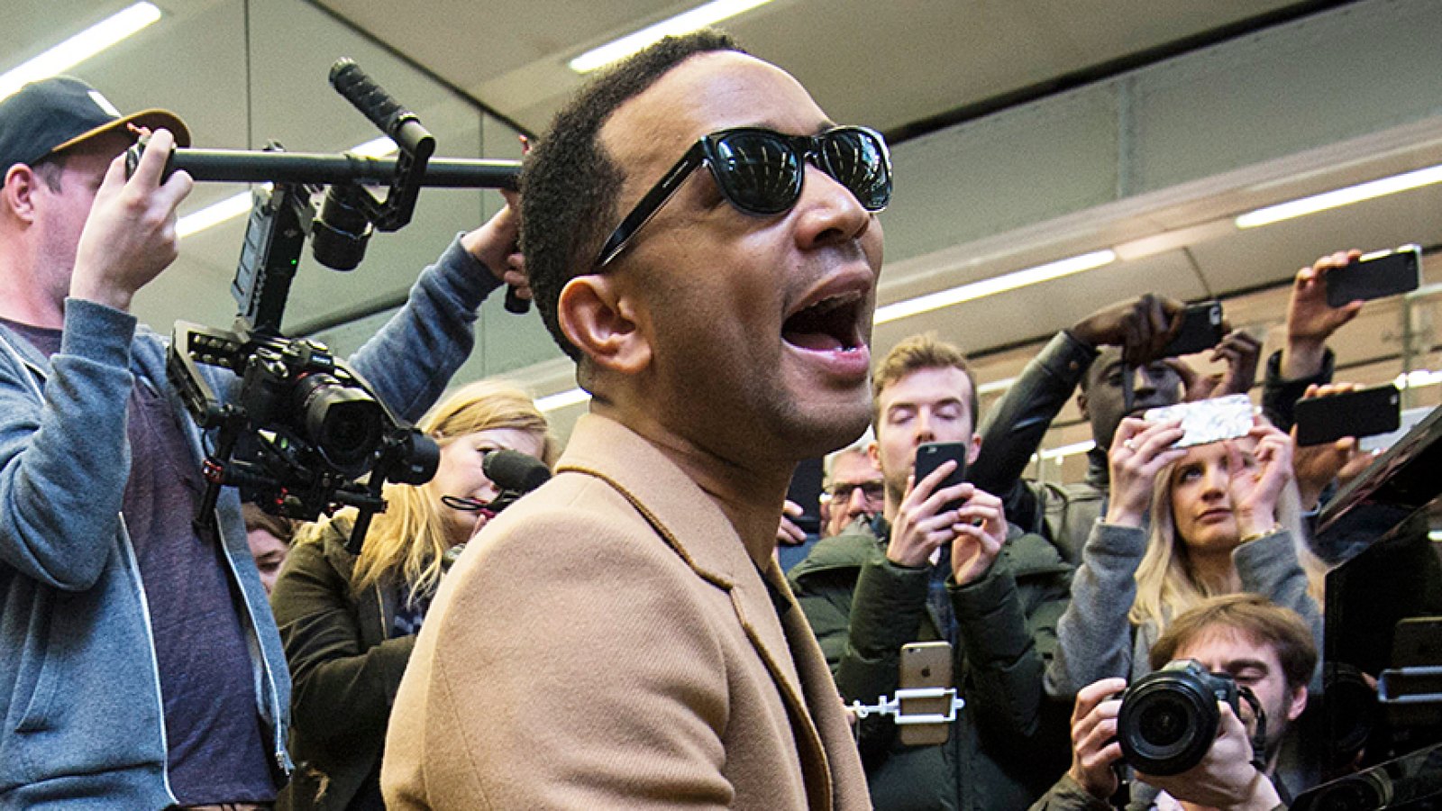 John Legend piano performing London train station