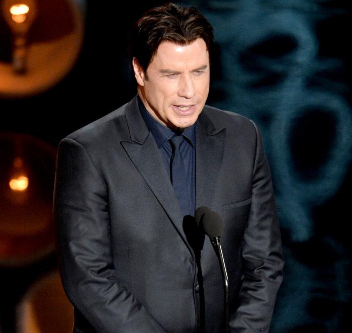 John Travolta speaks onstage during the Oscars at the Dolby Theatre on March 2, 2014 in Hollywood, California.