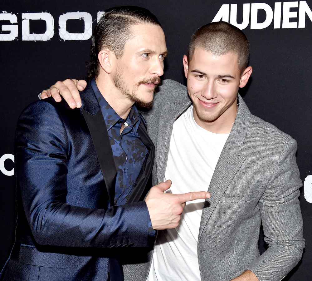 Jonathan Tucker (L) and Nick Jonas attend the premiere of DIRECTV's "Kingdom" Season 2 at SilverScreen Theater at the Pacific Design Center on October 6, 2015 in West Hollywood, California.