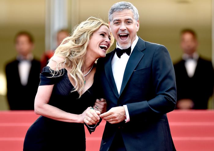 Julia Roberts and George Clooney attend the "Money Monster" premiere during the 69th annual Cannes Film Festival at the Palais des Festivals on May 12, 2016 in Cannes, France.