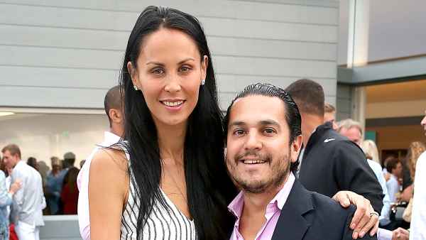 Julianne and Michael Wainstein attend the USTA Serves 2nd annual Pro-Am reception , sponsored by Sothebys, and BMW at The Bridge Golf Club on August 22, 2013 in Sag Harbor, New York.