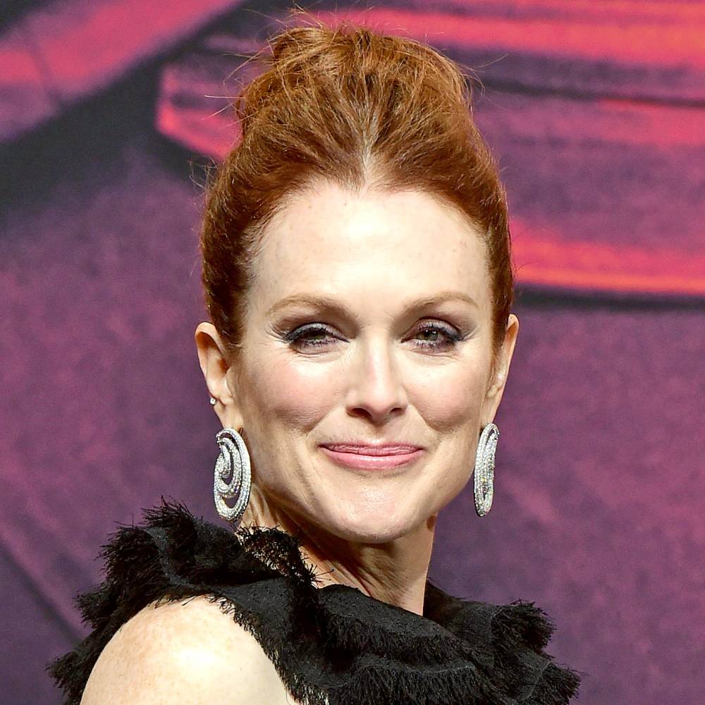 Julianne Moore poses for photographers on the red carpet as she arrives for the world premiere of the movie