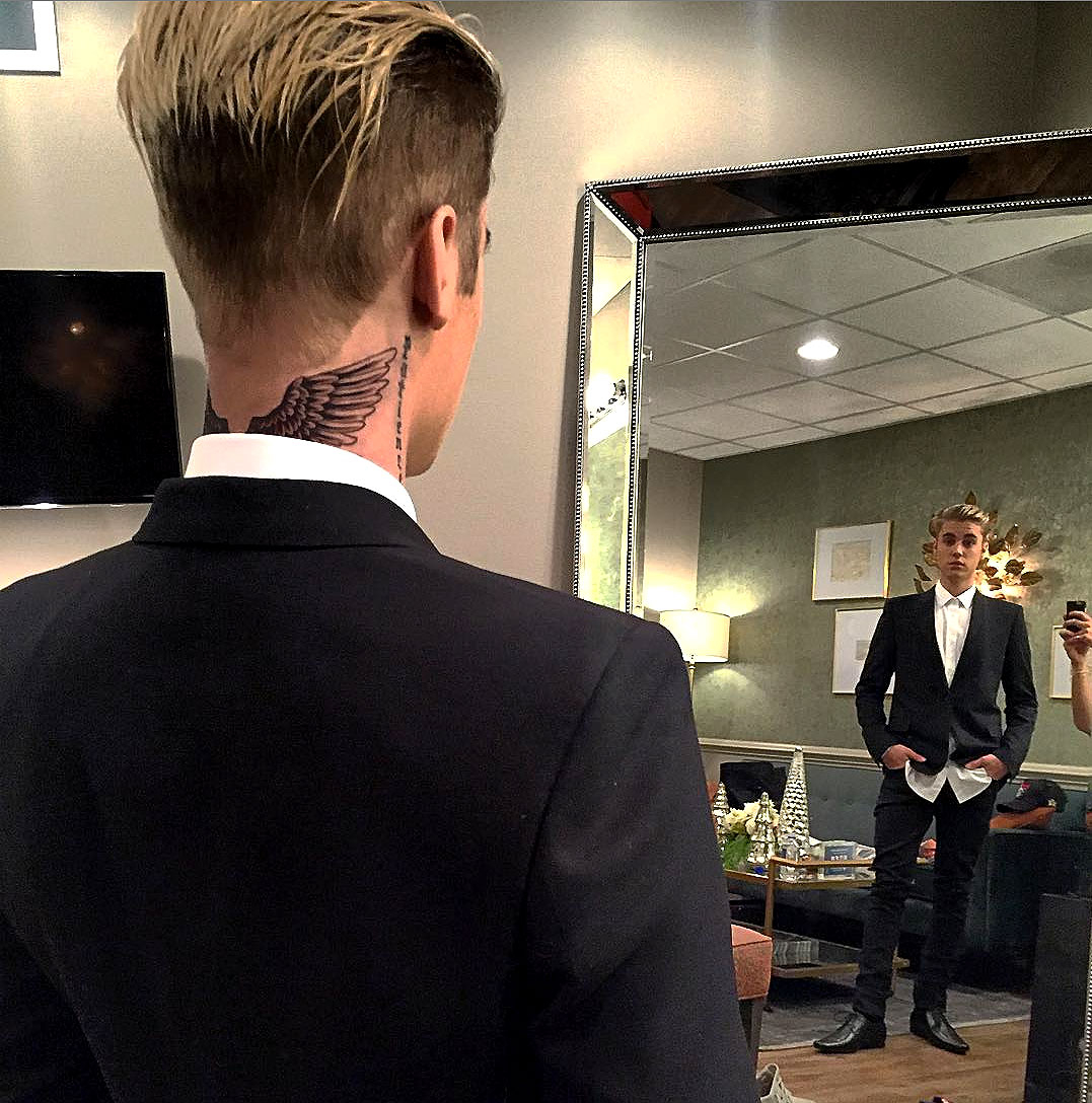 Justin Bieber Debuts Giant New Neck Tattoo With Wings Pics
