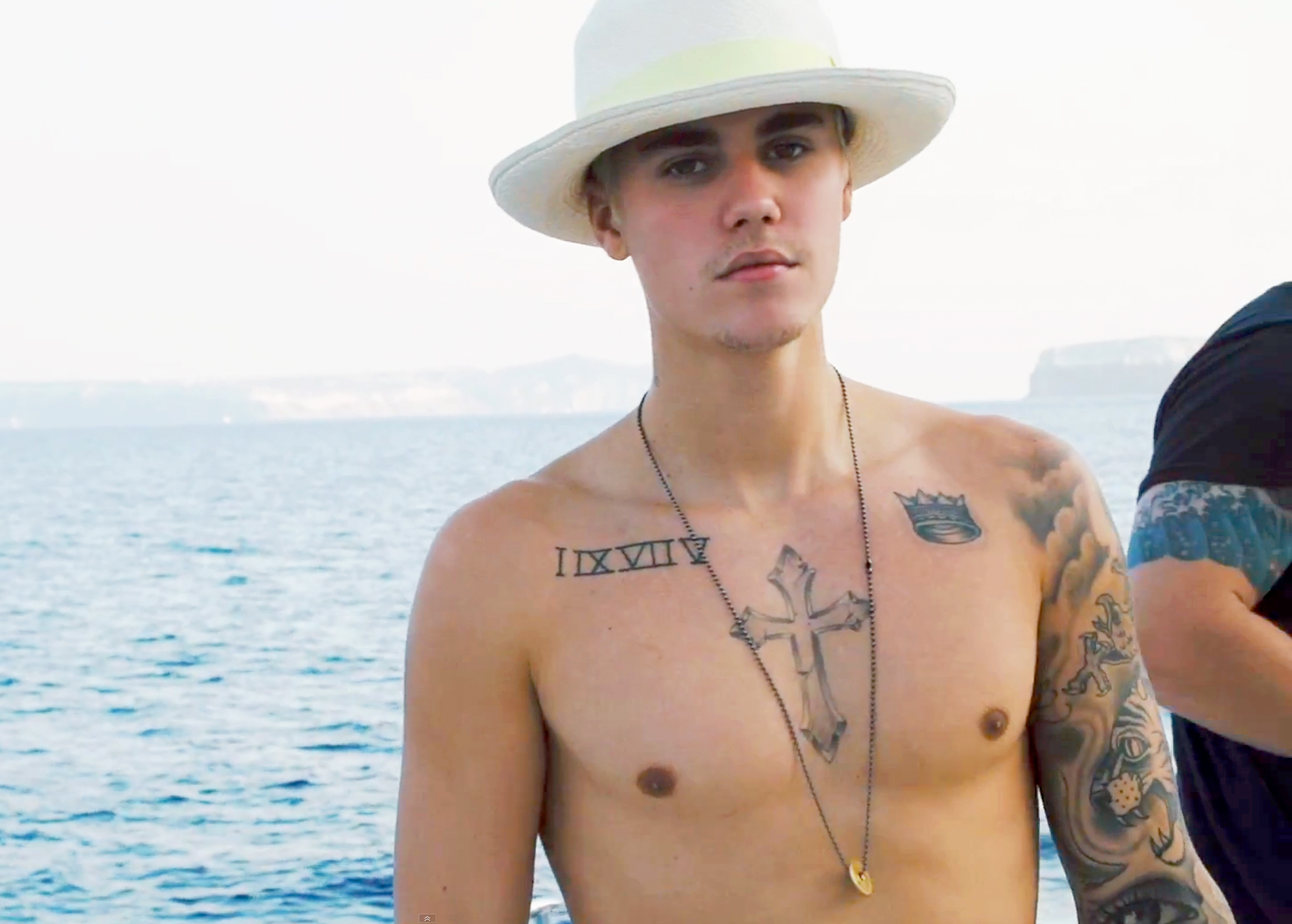 Justin Bieber S Company Video Features Shirtlessness Globetrotting