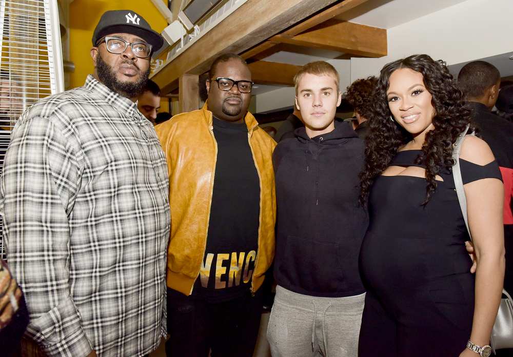 Songwriter Poo Bear, Justin Bieber, and Ashley Boyd pose for portrait at the Poo Bear GRAMMY Party at Serafina Sunset on February 11, 2017 in West Hollywood, California.