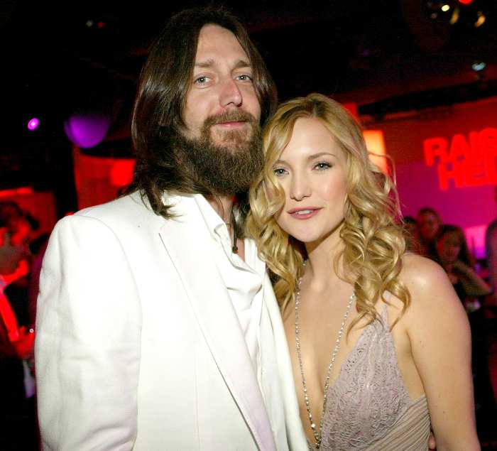 Kate Hudson and Chris Robinson pose as they attend the film premiere after party for the romantic comedy "Raising Helen" at the Highlands on May 26, 2004 in Hollywood, California.