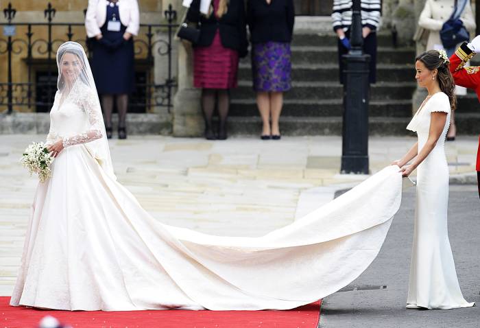 Pippa Middleton carrying Kate Middleton's wedding dress train