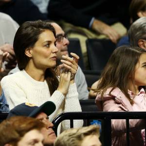 Katie Holmes and Suri Cruise watch a Notre Dame game