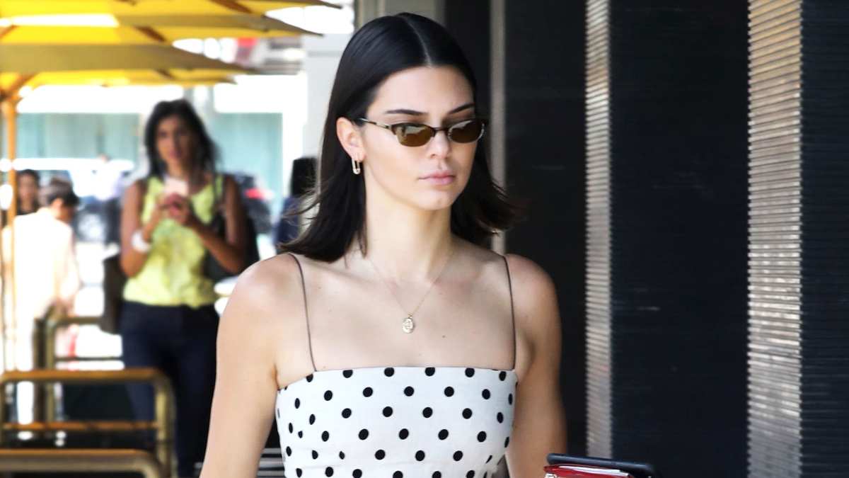 dragon bodycon dress Kendall Jenner looked stunning in a shimmery silver bodycon gown at L'Oreal Paris Fashion Show 2023. For her epic walk on the ramp at the L'Oreal showcase held during Paris Fashion Week, she chose a