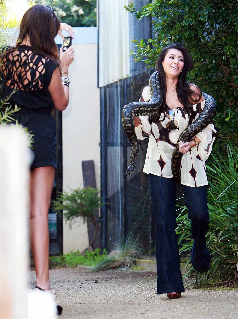 Kim Kardashian and a snake.