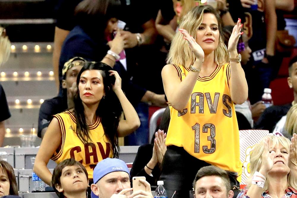 Kourtney Kardashian and Khloe Kardashian attend Game 4 of the 2017 NBA Finals between the Golden State Warriors and the Cleveland Cavaliers at Quicken Loans Arena on June 9, 2017 in Cleveland, Ohio.