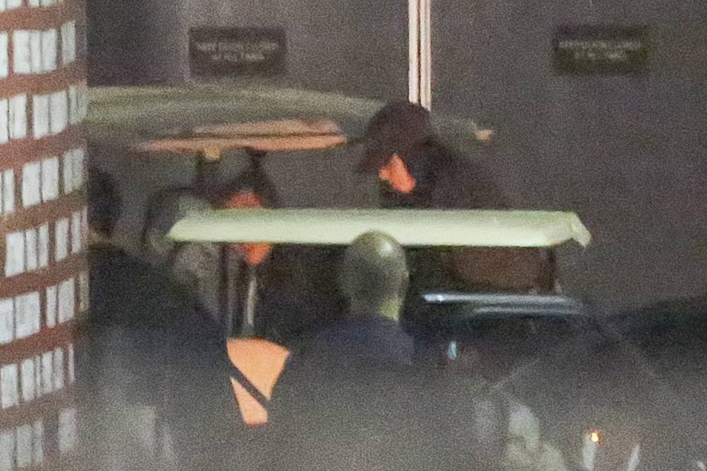 Kim Kardashian slips into another night of Kanye West's Pablo Tour in Inglewood.